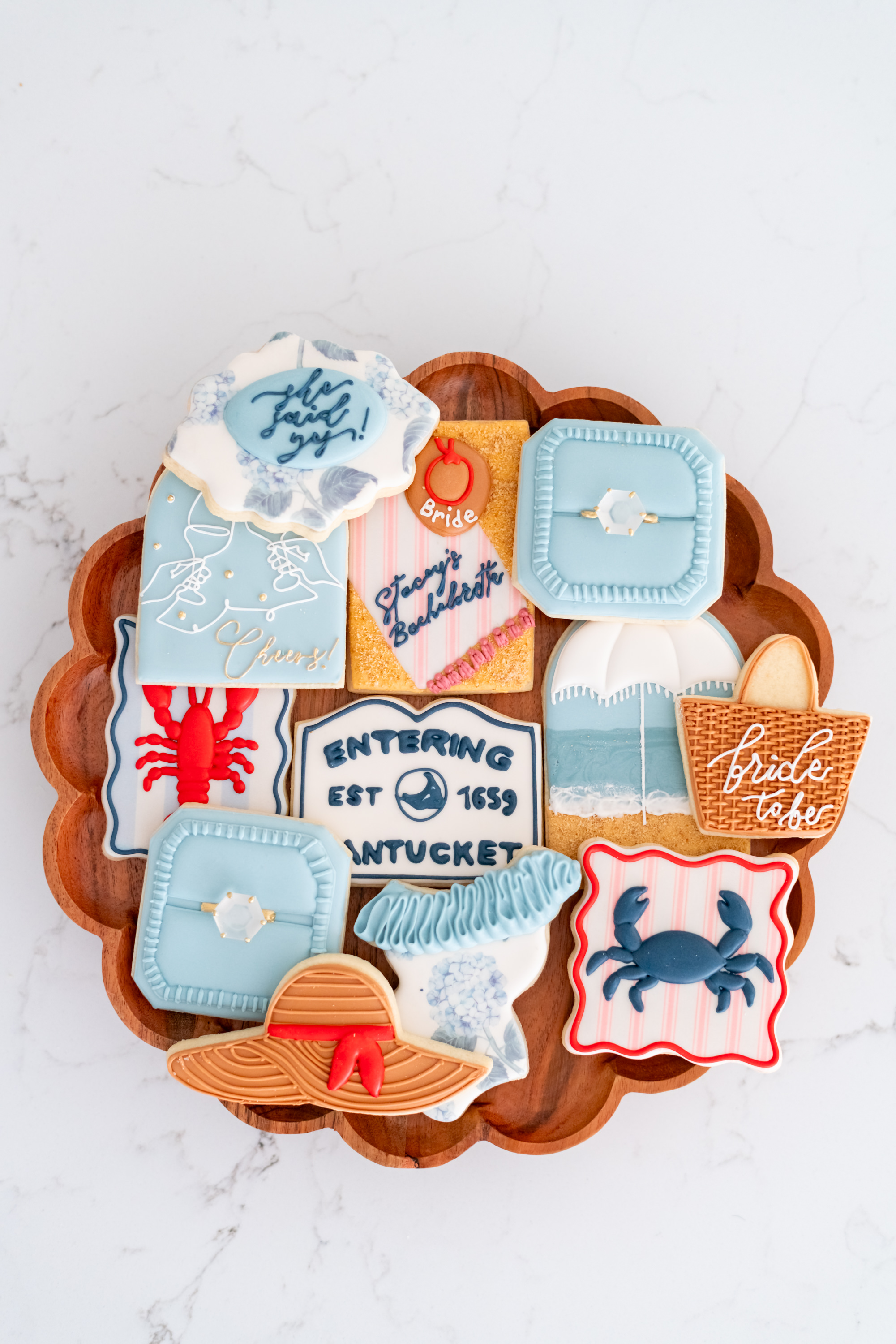 Beautiful Nantucket-themed custom decorated cookies showcasing variety and coastal charm