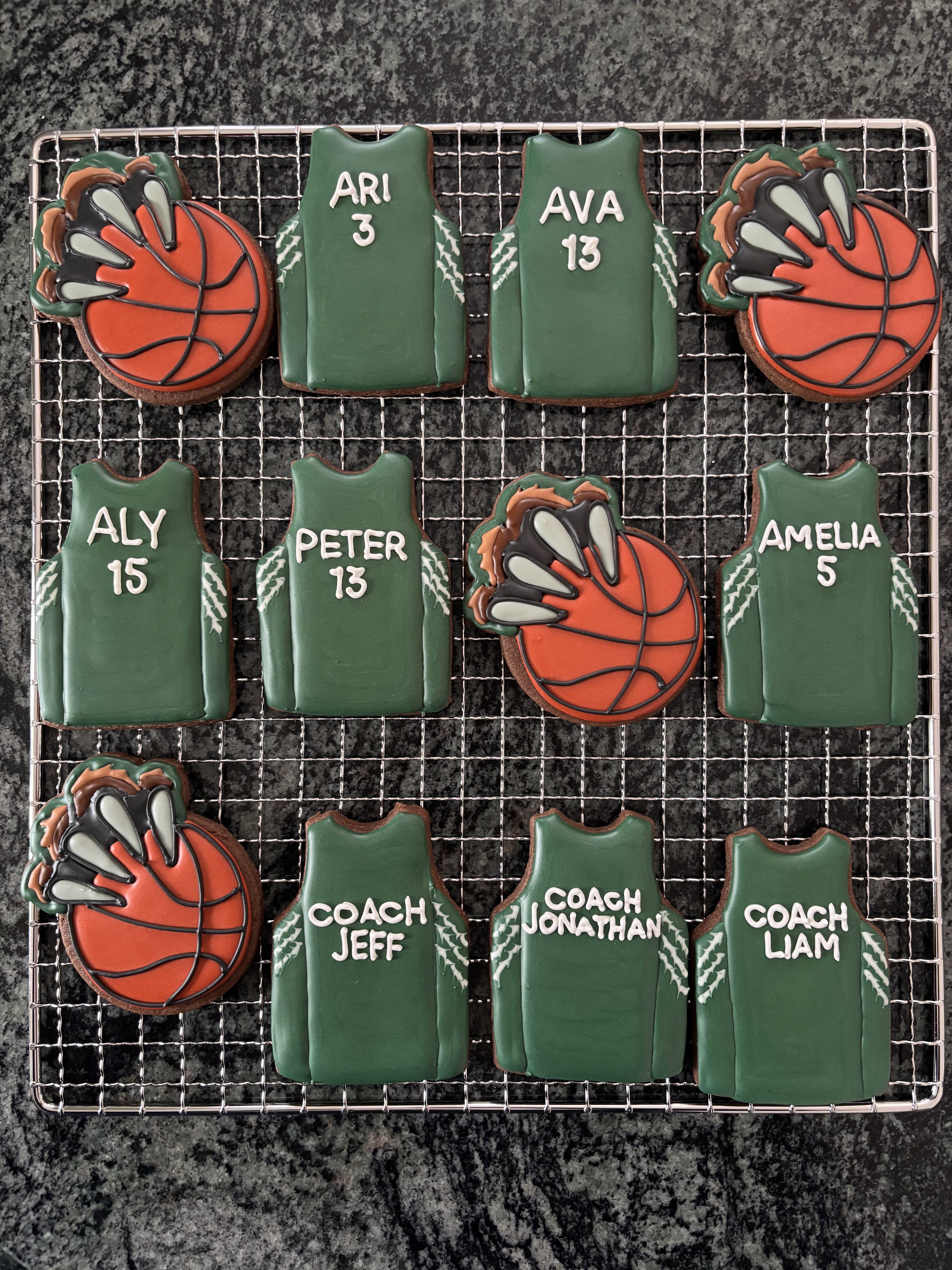 Basketball team green jerseys coach players